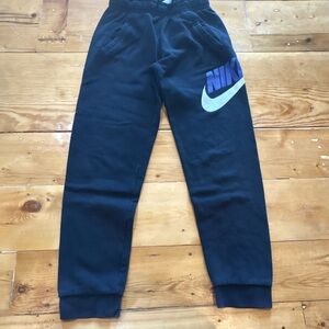 Nike Kids Black Joggers with Blue Logo